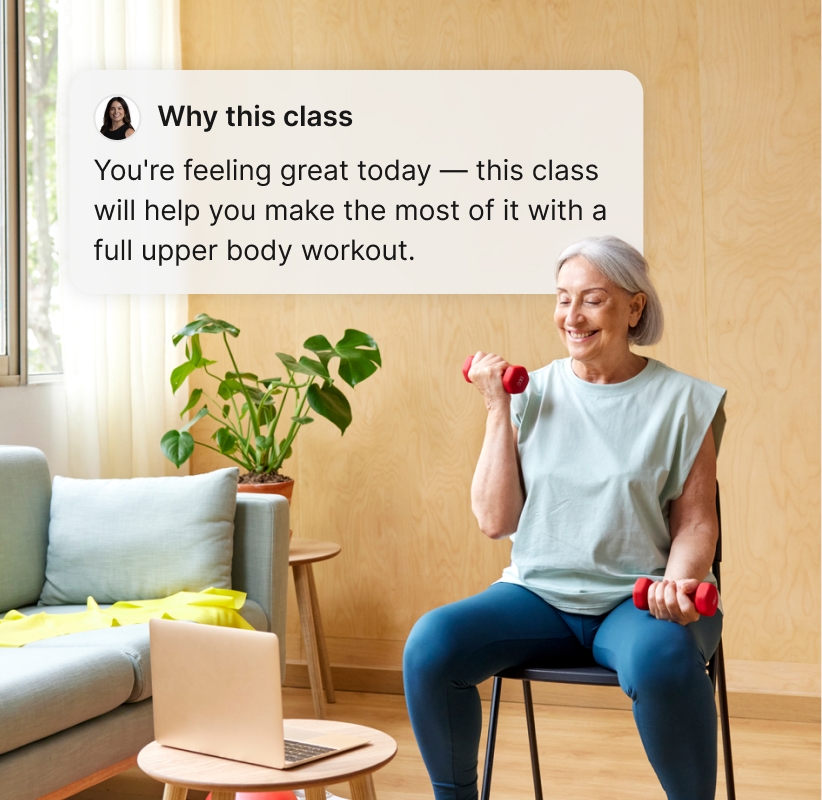 Older woman doing a seated dumbbell workout as the Bold app explains why the class was chosen
